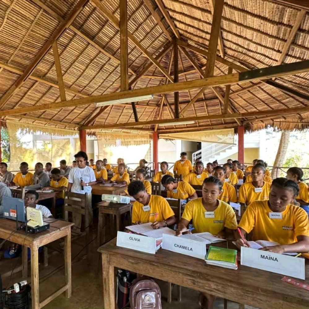 Students of the Wings of Change school in Madagascar learning in an open-air classroom